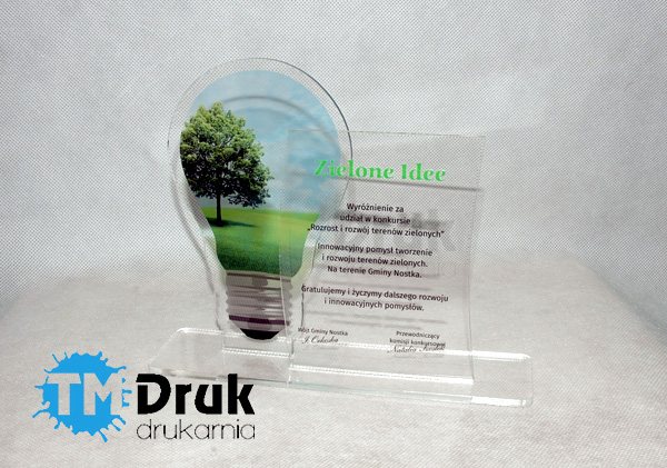 Statuetka na wyróżnienie w konkursie gminny, zrealizowane z bezpośrednim wydrukiem grafiki na bezbarwnej plexiglass